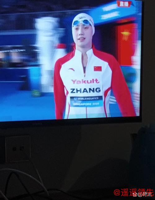 游泳世锦赛：覃海洋男子100米蛙泳夺金创历史 张雨霏摘得世锦赛个人首金